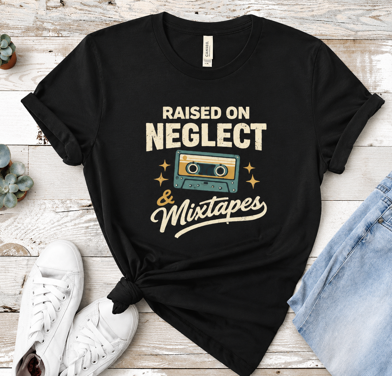 Raised on Neglect & Mixtapes T-Shirt — Retro Cassette Nostalgia Tee